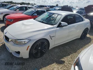 2015 BMW M4 with VIN WBS3U9C56FP968142, listed as a Copart auction lot 74034884 with Not Provided miles and Salvage Title. Bid and sale history available at carsss.com. Image 1.