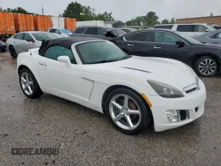 2008 Saturn Sky Red Line z VIN 1G8MG35X98Y102960, wystawiony jako Copart lot #61233914 z przebiegiem 129 890 mil mil oraz Szkody całkowita. Historia ofert i sprzedaży dostępna na DreamBid. Obrazek 4.