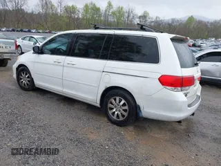 2010 Honda Odyssey EX-L with VIN 5FNRL3H65AB068497, listed as a IAAI auction lot 42013925 with 206,668 mi miles. Bid and sale history available at carsss.com. Image 3.