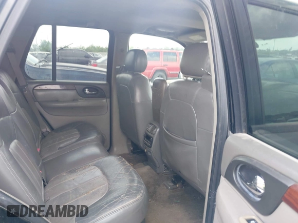 2004 GMC Envoy SLE with VIN 1GKDS13SX42398363, listed as a IAAI auction lot 42154134 with 308,001 mi miles and . Bid and sale history available at DreamBid. Image 8.