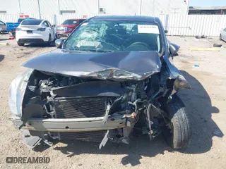 2017 Nissan Versa Sedan SV with VIN 3N1CN7AP1HL877990, listed as a IAAI auction lot 41829100 with 84,628 mi miles. Bid and sale history available at carsss.com. Image 6.