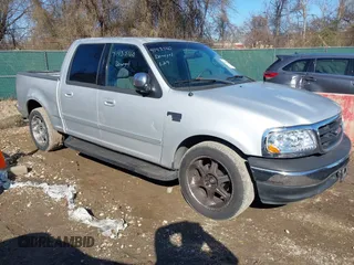 2002 Ford F-150 XLT with VIN 1FTRW07L42KA48341, listed as a IAAI auction lot 41433160 with 244,755 mi miles. Bid and sale history available at carsss.com. Image 1.