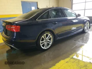 2014 Audi S6 Prestige z VIN WAUF2AFC2EN044116, wystawiony jako Copart lot #56415015 z przebiegiem 112 284 mil mil oraz Tytuł czysty. Historia ofert i sprzedaży dostępna na DreamBid. Obrazek 3.