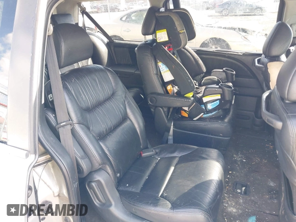 2007 Honda Odyssey Touring with VIN 5FNRL38827B045088, listed as a IAAI auction lot 42088752 with 224,655 mi miles. Bid and sale history available at carsss.com. Image 8.