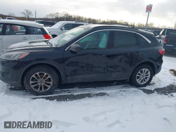 2020 Ford Escape SE z VIN 1FMCU9G64LUA05145, wystawiony jako IAAI lot #41250260 z przebiegiem 60 554 mil mil oraz . Historia ofert i sprzedaży dostępna na DreamBid. Obrazek 13.