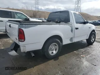 2002 Ford F-150 XL with VIN 1FTRF17212KC06180, listed as a Copart auction lot 45336625 with 214,139 mi miles and Salvage title. Bid and sale history available at DreamBid. Image 3.