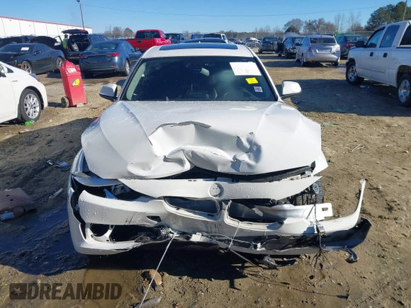 2013 BMW 3 Series 328i with VIN WBA3C1G55DNR49447, listed as a IAAI auction lot 41296098 with 126,605 mi miles and . Bid and sale history available at DreamBid. Image 12.