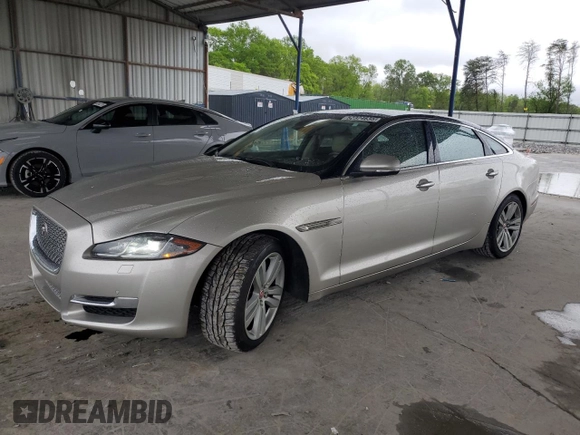 2016 Jaguar XJ Portfolio with VIN SAJWA2G70G8V93006, listed as a Copart auction lot 52324635 with 123,690 mi miles and Salvage Title. Bid and sale history available at DreamBid. Image 1.