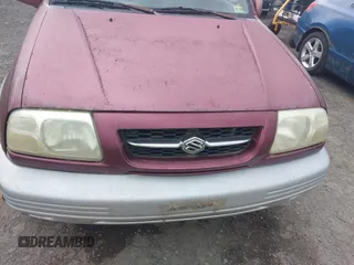 2000 Suzuki Grand Vitara JLX z VIN JS3TD62V7Y4119022, wystawiony jako IAAI lot #42384608 z przebiegiem 153 943 mil mil oraz . Historia ofert i sprzedaży dostępna na DreamBid. Obrazek 6.