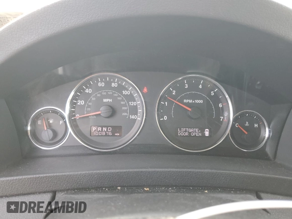 2009 Jeep Grand Cherokee Laredo with VIN 1J8HR48P89C552691, listed as a Copart auction lot 82080964 with 100,876 mi miles and Salvage Title. Bid and sale history available at carsss.com. Image 9.