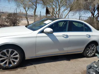 2019 Mercedes-Benz E-Class E 300 with VIN WDDZF4JBXKA597397, listed as a IAAI auction lot 41724672 with 99,258 mi miles. Bid and sale history available at carsss.com. Image 14.