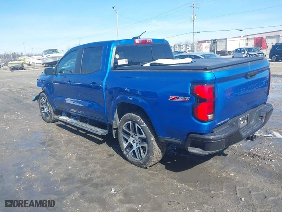 2023 Chevrolet Colorado 4WD Z71 with VIN 1GCPTDEKXP1247067, listed as a IAAI auction lot 41760802 with 21,259 mi miles. Bid and sale history available at carsss.com. Image 3.