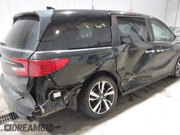 2023 Honda Odyssey Touring z VIN 5FNRL6H85PB039450, wystawiony jako IAAI lot #41504351 z przebiegiem 51 000 mil mil oraz . Historia ofert i sprzedaży dostępna na DreamBid. Obrazek 6.