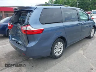 2015 Toyota Sienna XLE with VIN 5TDYK3DC3FS676919, listed as a IAAI auction lot 42475307 with 99,574 mi miles and . Bid and sale history available at DreamBid. Image 4.