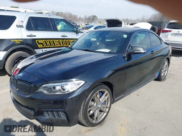 2015 BMW 2 Series M235i with VIN WBA1J7C55FV358964, listed as a IAAI auction lot 41674800 with 63,504 mi miles and . Bid and sale history available at carsss.com. Image 17.