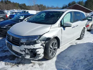 2023 Honda Odyssey Touring with VIN 5FNRL6H81PB008129, listed as a IAAI auction lot 41610714 with 57,273 mi miles and . Bid and sale history available at DreamBid. Image 2.