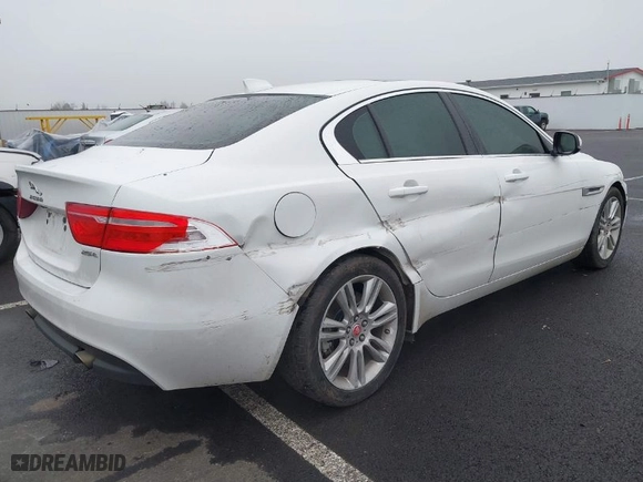 2019 Jaguar XE 25t with VIN SAJAR4FX0KCP52659, listed as a IAAI auction lot 41332080 with 96,936 mi miles. Bid and sale history available at carsss.com. Image 4.