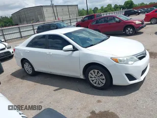 2014 Toyota Camry L with VIN 4T4BF1FK2ER375590, listed as a IAAI auction lot 42101553 with 126,849 mi miles and . Bid and sale history available at DreamBid. Image 13.
