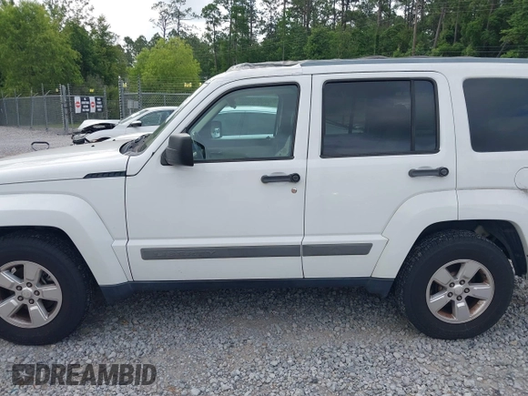 2012 Jeep Liberty Sport Latitude z VIN 1C4PJLAKXCW145609, wystawiony jako IAAI lot #42342281 z przebiegiem 107 256 mil mil oraz . Historia ofert i sprzedaży dostępna na DreamBid. Obrazek 6.
