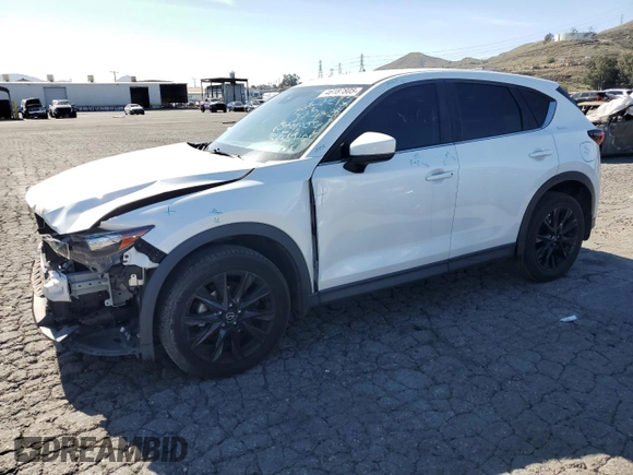 2021 Mazda CX-5 Sport with VIN JM3KFABM4M1321480, listed as a Copart auction lot 46187805 with 66,382 mi miles and Salvage Title. Bid and sale history available at carsss.com. Image 1.
