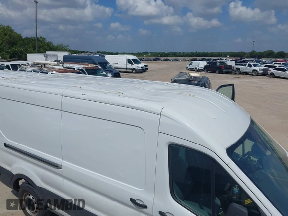 2019 Ford Transit with VIN 1FTBW2CM2KKB73009, listed as a IAAI auction lot 42739561 with 144,807 mi miles and . Bid and sale history available at DreamBid. Image 6.