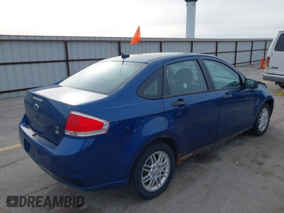 2009 Ford Focus SE with VIN 1FAHP35N39W176884, listed as a IAAI auction lot 41865864 with 193,747 mi miles. Bid and sale history available at carsss.com. Image 4.