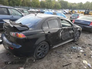 2015 Mitsubishi Lancer GT with VIN JA32U8FW6FU012323, listed as a Copart auction lot 73822644 with 69,317 mi miles and Salvage Title. Bid and sale history available at carsss.com. Image 3.