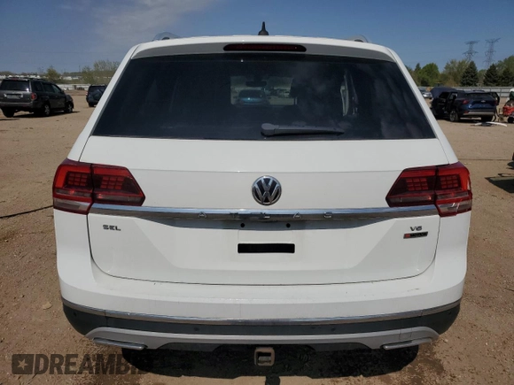 2018 Volkswagen Atlas SEL Premium z VIN 1V2NR2CAXJC539249, wystawiony jako Copart lot #55992035 z przebiegiem 132 814 mil mil oraz Szkoda całkowita • Salvage title. Historia ofert i sprzedaży dostępna na DreamBid. Obrazek 6.