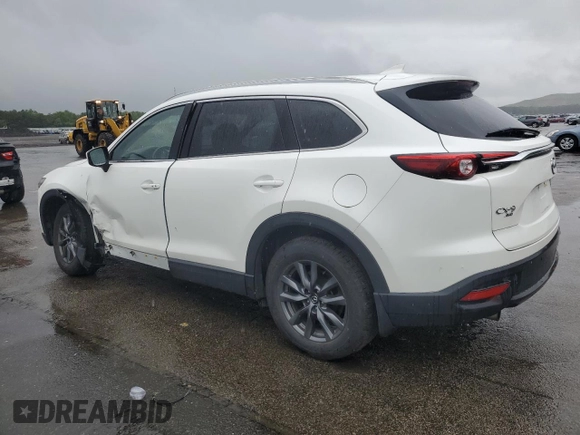 2021 Mazda CX-9 Touring z VIN JM3TCBCY1M0536616, wystawiony jako Copart lot #60242445 z przebiegiem 40 057 mil mil oraz Szkoda całkowita • Salvage title. Historia ofert i sprzedaży dostępna na DreamBid. Obrazek 2.