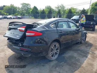 2019 Ford Fusion Titanium with VIN 3FA6P0D92KR247270, listed as a IAAI auction lot 42474803 with Not provided miles and . Bid and sale history available at DreamBid. Image 4.