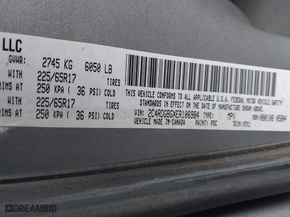 2014 Dodge Grand Caravan SE with VIN 2C4RDGBGXER106984, listed as a IAAI auction lot 41815414 with 170,984 mi miles. Bid and sale history available at carsss.com. Image 9.