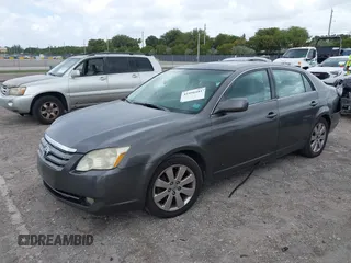 2007 Toyota Avalon XL with VIN 4T1BK36B77U213734, listed as a IAAI auction lot 41956181 with 223,857 mi miles. Bid and sale history available at carsss.com. Image 2.