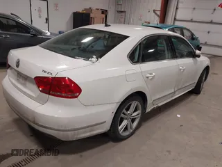 2014 Volkswagen Passat SEL Premium with VIN 1VWCS7A36EC057394, listed as a IAAI auction lot 41254293 with 134,715 mi miles. Bid and sale history available at carsss.com. Image 4.