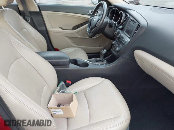 2013 Kia Optima EX z VIN 5XXGN4A78DG141924, wystawiony jako IAAI lot #41474952 z przebiegiem 172 814 mil mil oraz . Historia ofert i sprzedaży dostępna na DreamBid. Obrazek 5.
