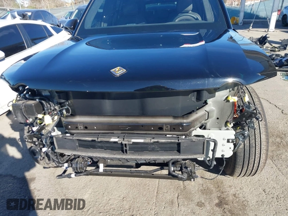 2025 Rivian R1S Adventure z VIN 7PDSGBBA4SN047584, wystawiony jako IAAI lot #41372645 z przebiegiem 501 mil mil oraz . Historia ofert i sprzedaży dostępna na DreamBid. Obrazek 6.