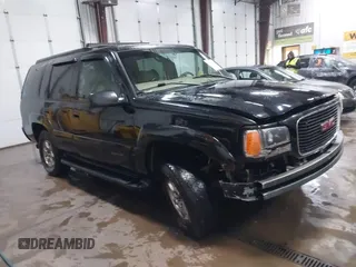 2000 GMC Denali with VIN 1GKEK13R9YR163824, listed as a IAAI auction lot 41245808 with 206,773 mi miles. Bid and sale history available at carsss.com. Image 1.
