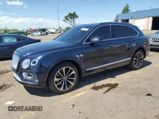 2017 Bentley Bentayga W12 z VIN SJAAC2ZV2HC014547, wystawiony jako Copart lot #57488755 z przebiegiem 63 359 mil mil oraz Tytuł czysty. Historia ofert i sprzedaży dostępna na DreamBid. Obrazek 1.