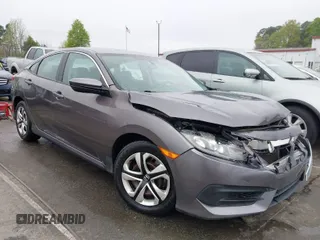 2017 Honda Civic LX z VIN 19XFC2F53HE023730, wystawiony jako IAAI lot #41885003 z przebiegiem 129 595 mil mil oraz . Historia ofert i sprzedaży dostępna na DreamBid. Obrazek 1.