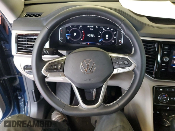 2023 Volkswagen Atlas SE z VIN 1V2HR2CA5PC527628, wystawiony jako IAAI lot #42569146 z przebiegiem 27 424 mil mil oraz . Historia ofert i sprzedaży dostępna na DreamBid. Obrazek 6.