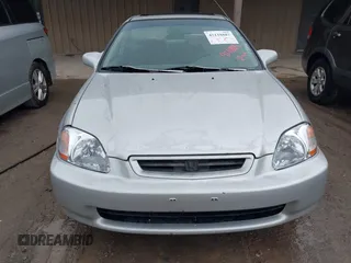 1997 Honda Civic EX z VIN 1HGEJ8144VL050538, wystawiony jako IAAI lot #42118882 z przebiegiem 384 347 mil mil oraz . Historia ofert i sprzedaży dostępna na DreamBid. Obrazek 6.