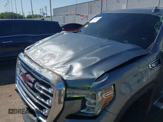 2019 GMC Sierra 1500 SLT z VIN 3GTP8DED7KG308047, wystawiony jako IAAI lot #41978970 z przebiegiem 112 662 mil mil oraz . Historia ofert i sprzedaży dostępna na DreamBid. Obrazek 6.