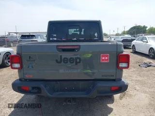 2021 Jeep Gladiator Sport S z VIN 1C6JJTAG9ML538769, wystawiony jako IAAI lot #42078142 z przebiegiem 49 924 mil mil oraz . Historia ofert i sprzedaży dostępna na DreamBid. Obrazek 16.