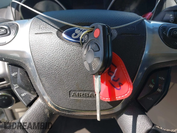 2012 Ford Focus SEL with VIN 1FAHP3M21CL413436, listed as a IAAI auction lot 42011706 with 392,754 mi miles. Bid and sale history available at carsss.com. Image 11.