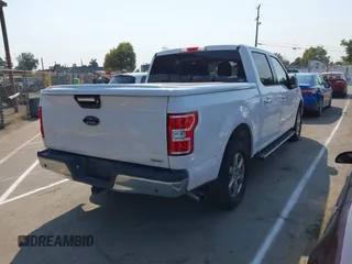 2019 Ford F-150 XL with VIN 1FTEW1C44KKC60773, listed as a IAAI auction lot 42706042 with 185,864 mi miles and . Bid and sale history available at DreamBid. Image 4.