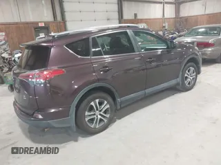 2018 Toyota RAV4 LE with VIN 2T3BFREV0JW759714, listed as a IAAI auction lot 41823084 with 119,909 mi miles and . Bid and sale history available at DreamBid. Image 4.