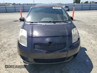 2008 Toyota Yaris with VIN JTDJT923785177098, listed as a Copart auction lot 56070785 with 138,152 mi miles and Salvage Title. Bid and sale history available at DreamBid. Image 5.