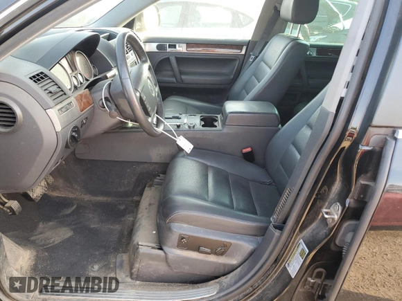 2010 Volkswagen Touareg VR6 with VIN WVGBF7A9XAD001790, listed as a Copart auction lot 70806534 with 90,103 mi miles and Salvage Title. Bid and sale history available at DreamBid. Image 7.