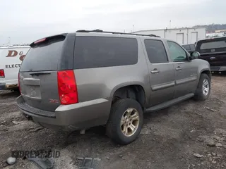 2007 GMC Yukon XL SLT with VIN 1GKFK16367J222143, listed as a IAAI auction lot 41676370 with 211,565 mi miles. Bid and sale history available at carsss.com. Image 4.