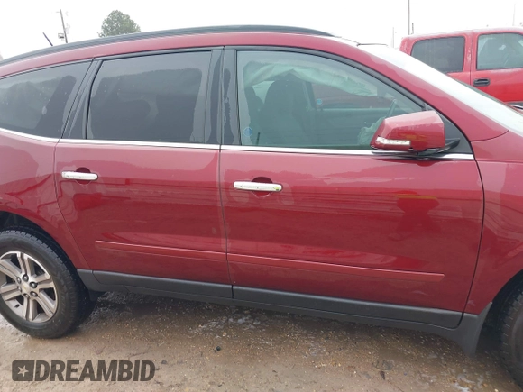 2016 Chevrolet Traverse LT z VIN 1GNKRHKD5GJ213065, wystawiony jako IAAI lot #41488144 z przebiegiem 146 625 mil mil oraz . Historia ofert i sprzedaży dostępna na DreamBid. Obrazek 14.