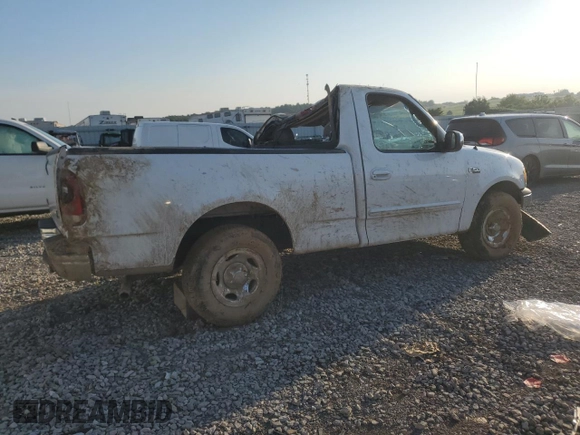2000 Ford F-150 XL with VIN 1FTZF1727YKB49797, listed as a Copart auction lot 62154595 with Not provided miles and Salvage title. Bid and sale history available at DreamBid. Image 3.